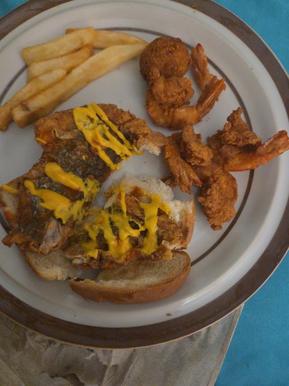 Seafood menu featuring crabs, grouper, and hush puppies.